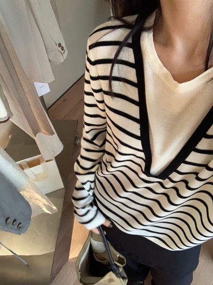 *   Layered V-Neck Knit