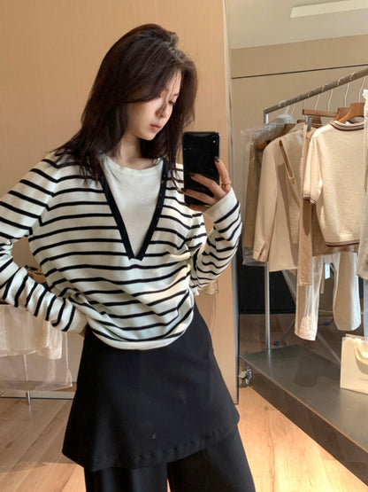 *   Layered V-Neck Knit