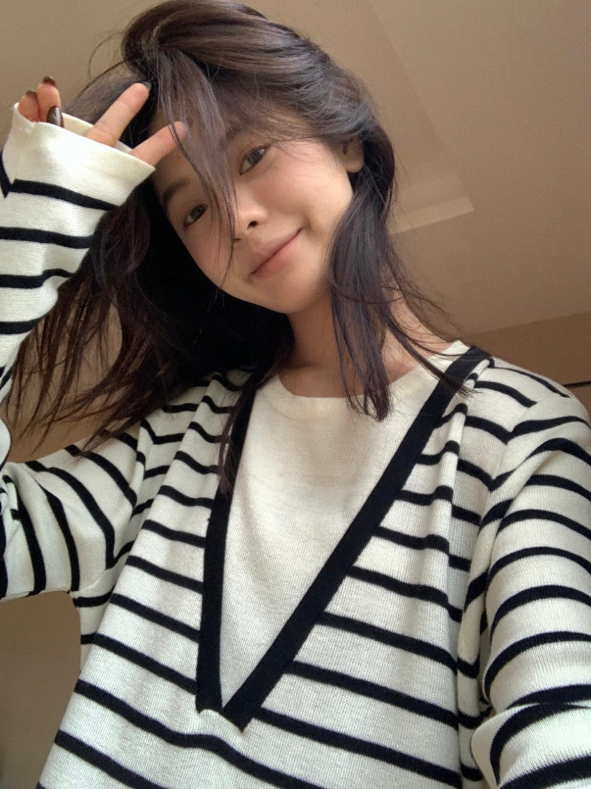 *   Layered V-Neck Knit